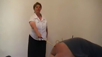 Older Woman Uses A Cane On A Man